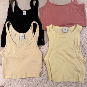 TNA tank tops